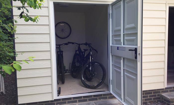 Lockable steel door store for bikes golf clubs at Tintern Abbey Cottage